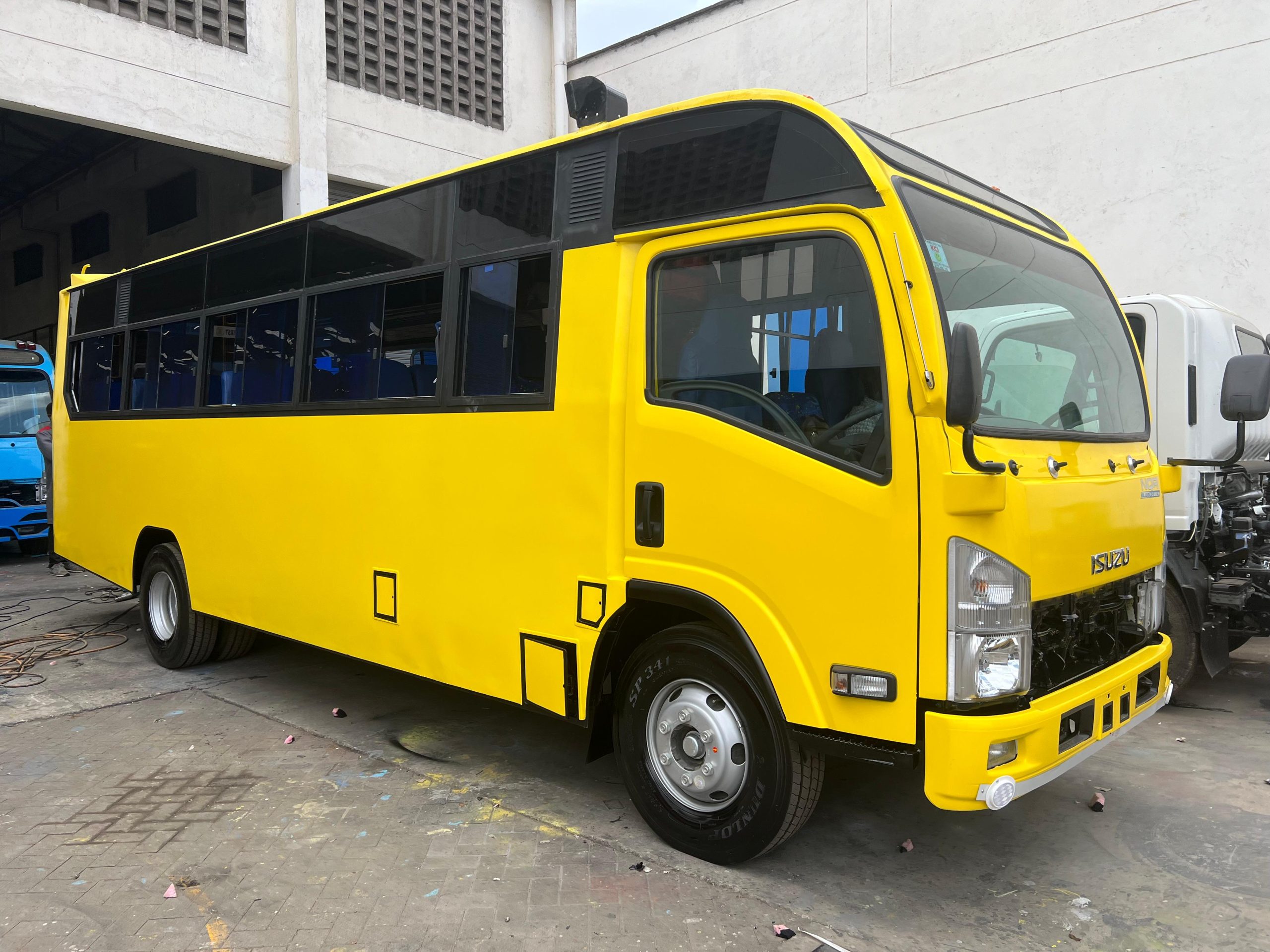 ISUZU NMR 26 SEATER BUS